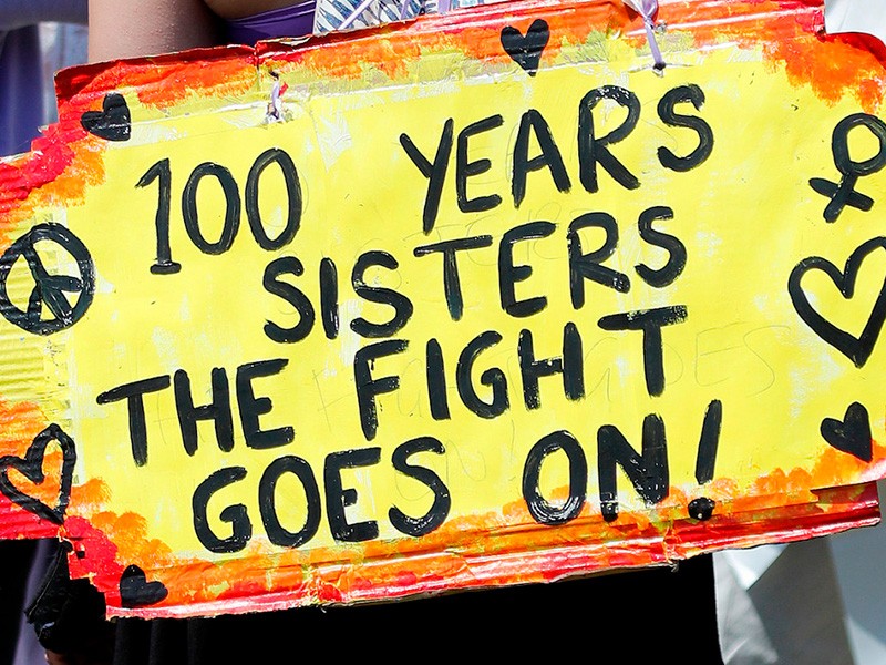 Poster with text: 100 years sisters. The fight goes on!