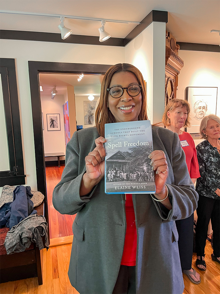 New York State Attorney General Letitia James holding her copy of Spell Freedom in Cooperstown, NY.